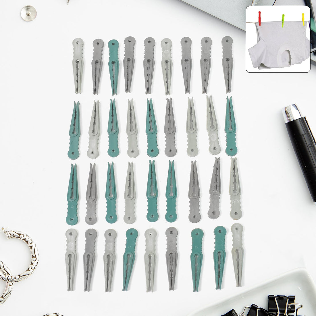 A set of 36 colourful plastic cloth pegs in a clear plastic basket, ready for laundry.