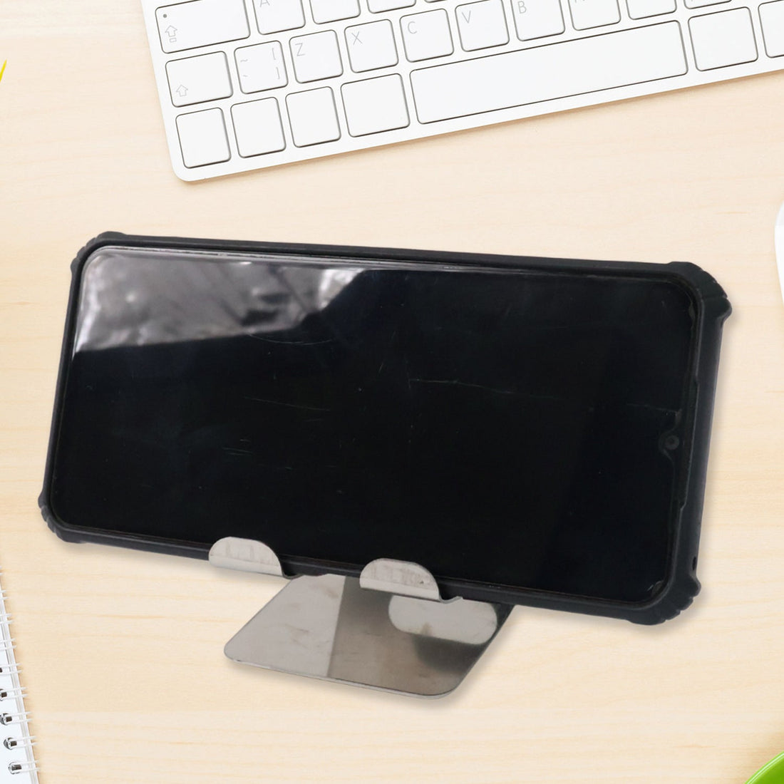 Side angle view of mobile and tablet stand holder showcasing sleek design