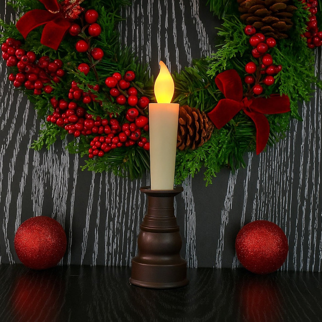 Close-up of premium decorative LED candle flame and classic holder
