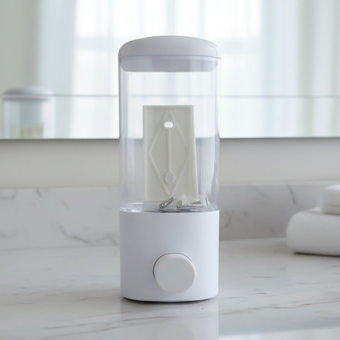 Manual push button soap dispenser installed on wall