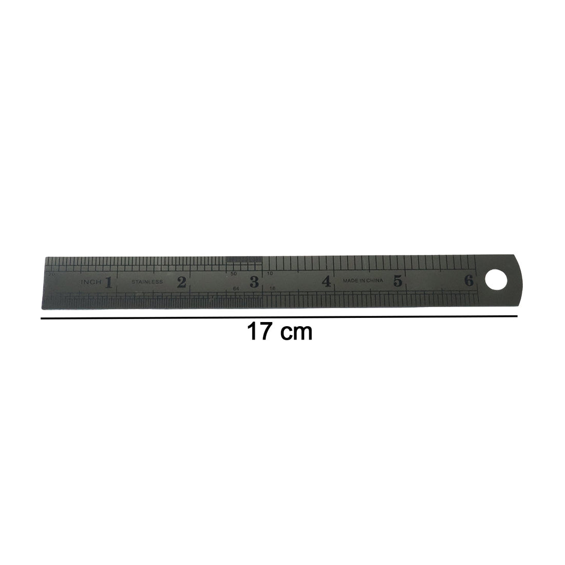 Close-up showing detailed markings on steel measuring ruler