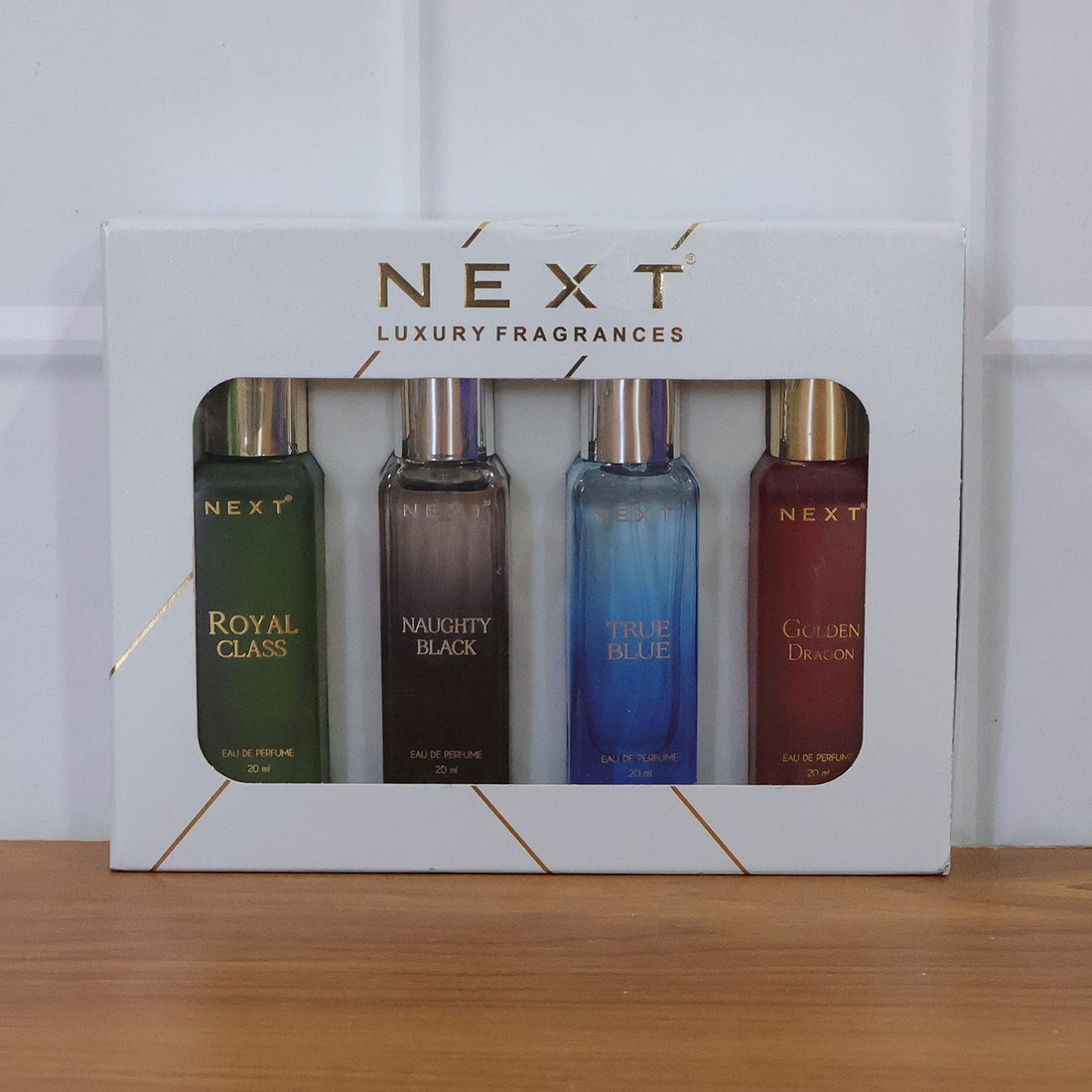 Premium mini fragrance gift pack with four bottles