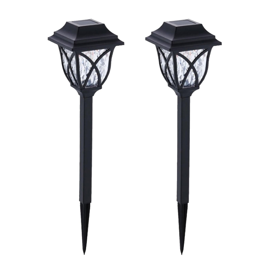 FitFuzion solar pathway lights casting bright, artistic patterns on a dark garden path, enhancing outdoor decor.