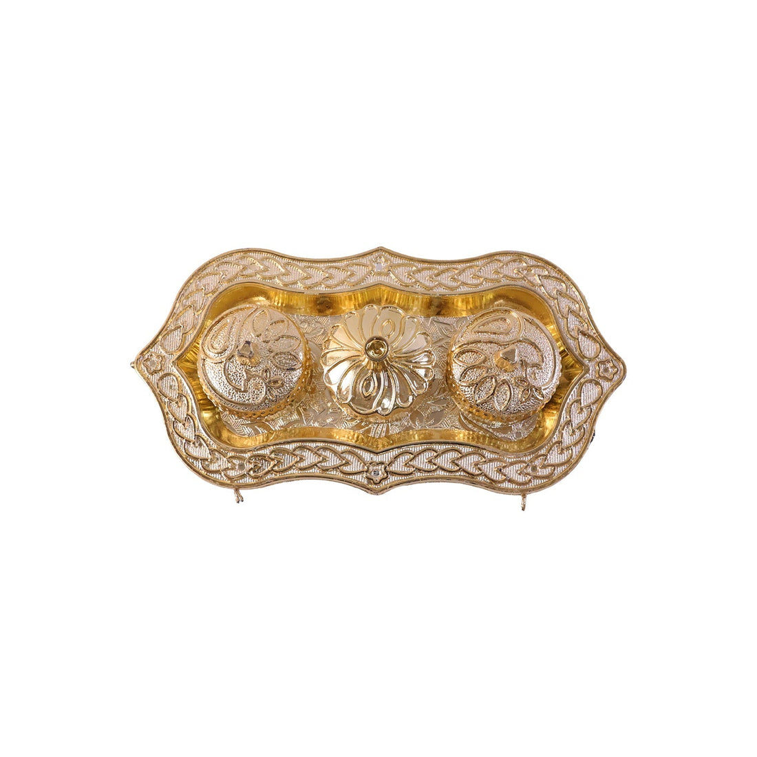 Studio shot of the golden Kankavati on a white background.
