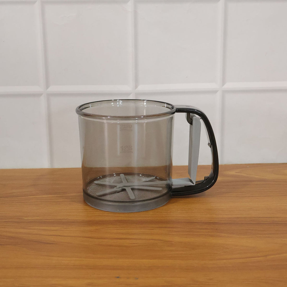 Kitchen baking gadget plastic flour sieve cup in use