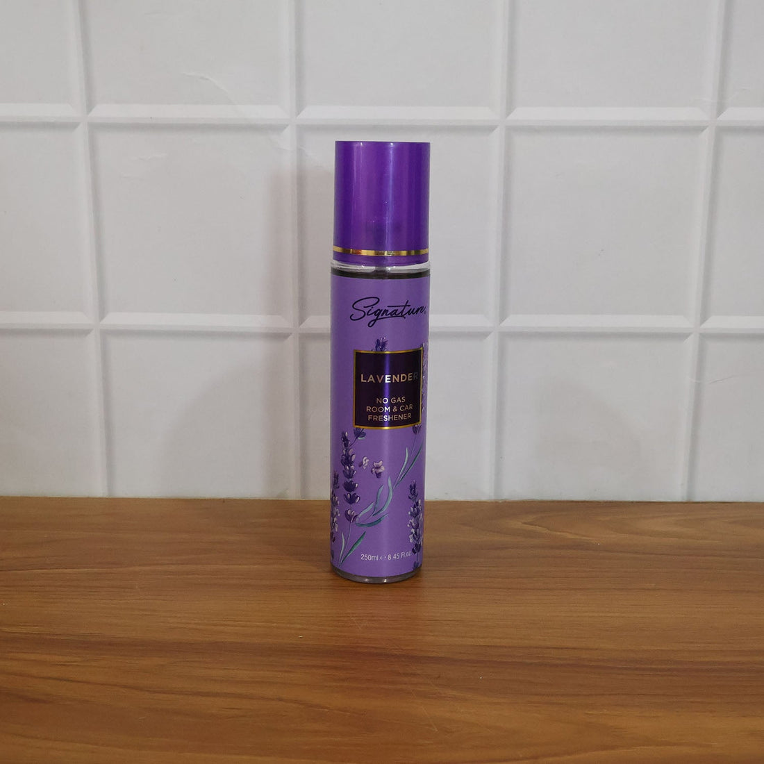 Elegant Signature lavender air freshener spray bottle designed for easy use