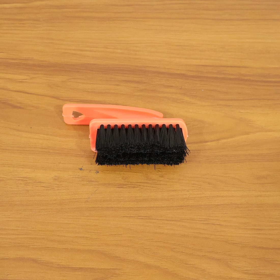 Shoe cleaning brush in live use cleaning sneakers and household surfaces