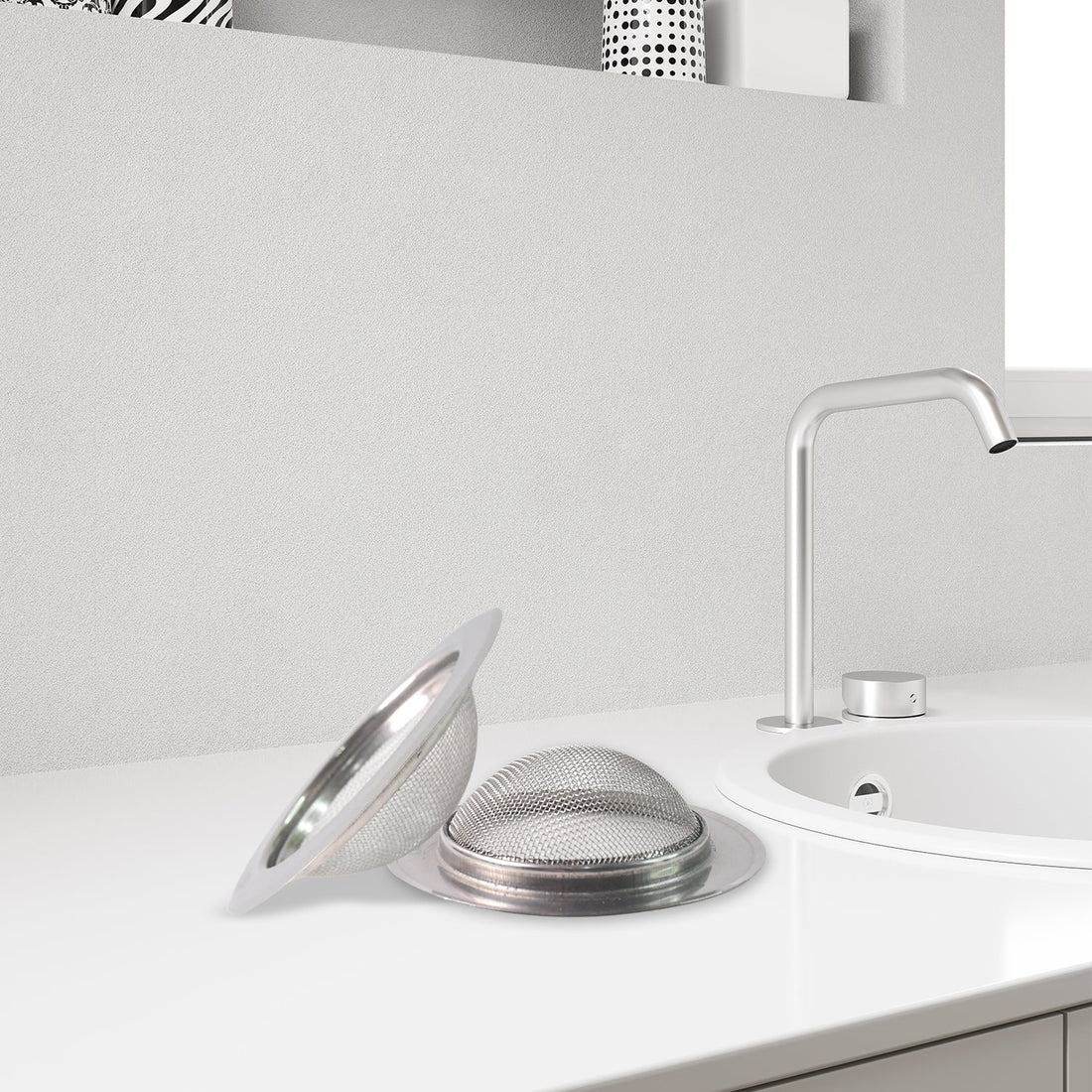 Sink strainer showing perforated holes for effective water flow