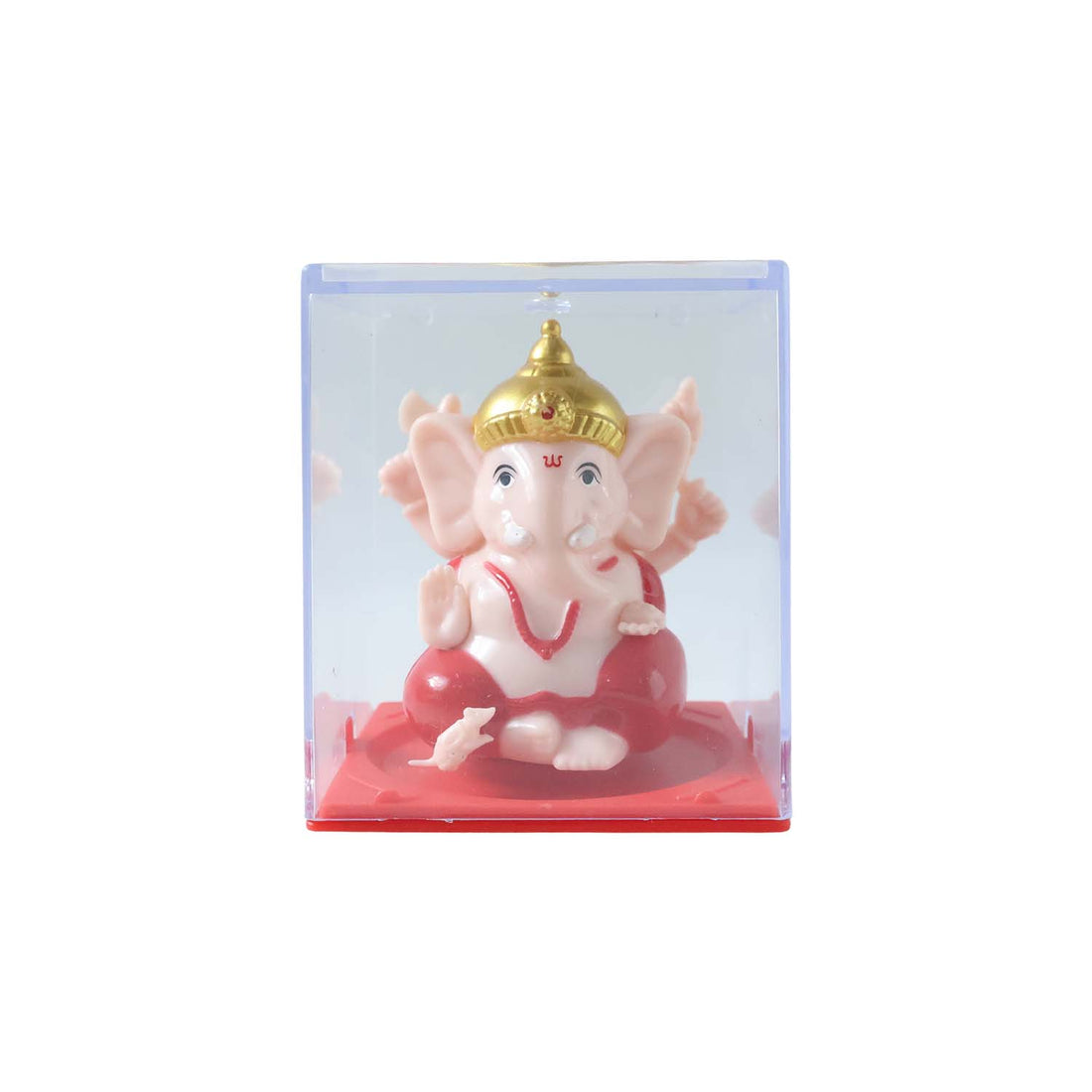 Close-up image highlighting bright red and gold details on Ganesha idol